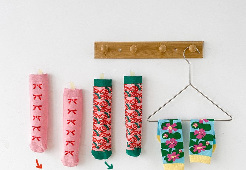 Vivid Expression sock roses and bow colletion