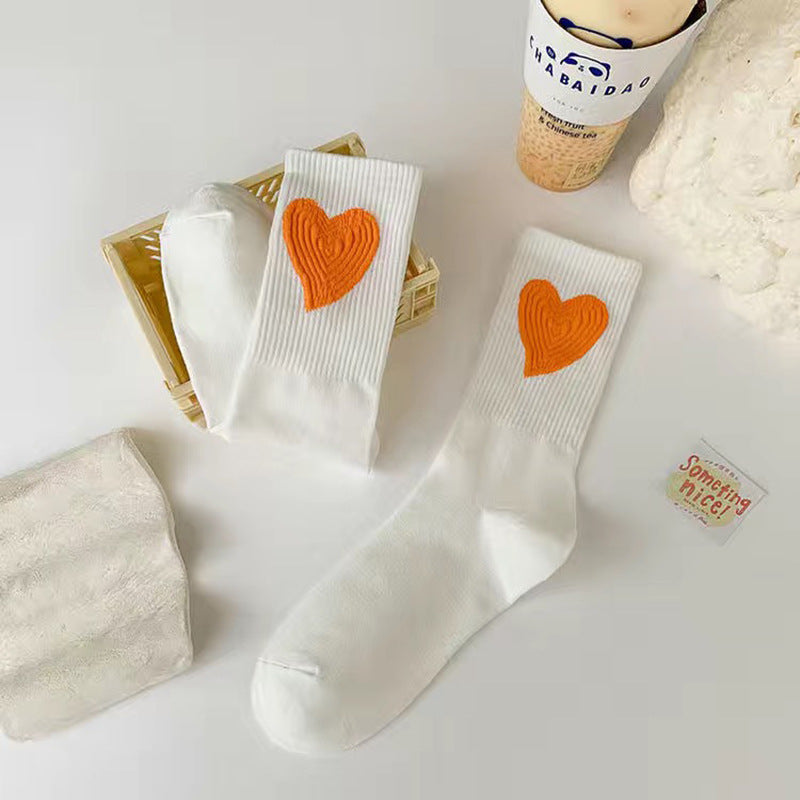 Heartfelt Warmth Socks in white with orange heart