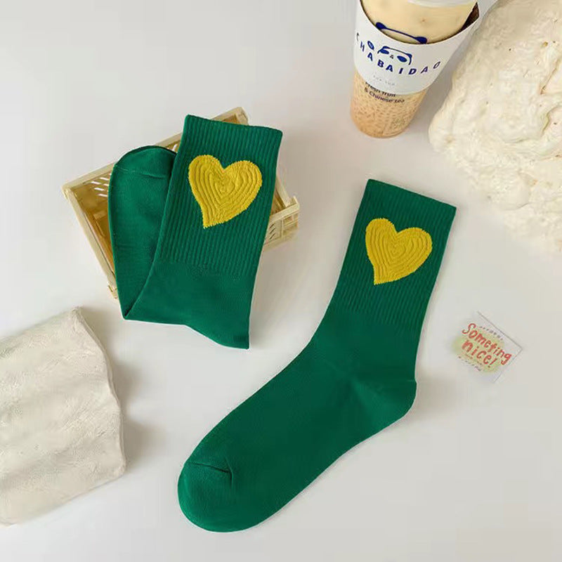 Heartfelt Warmth Socks in green with yellow heart