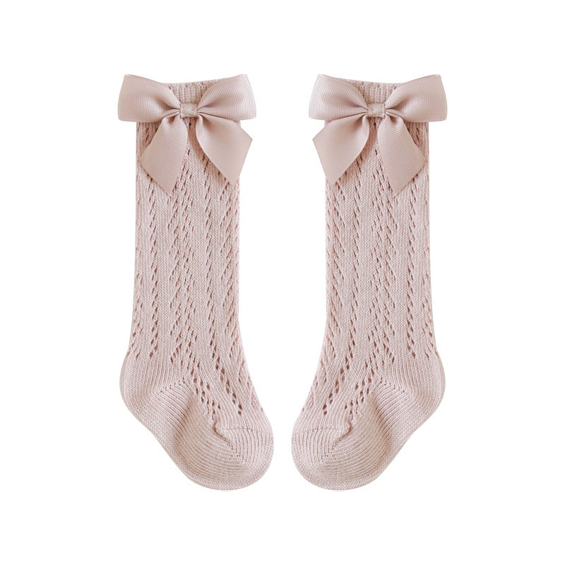 Baby calf socks in pink with bow