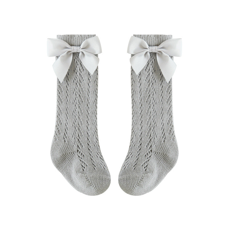 Baby calf socks in light grey with bow