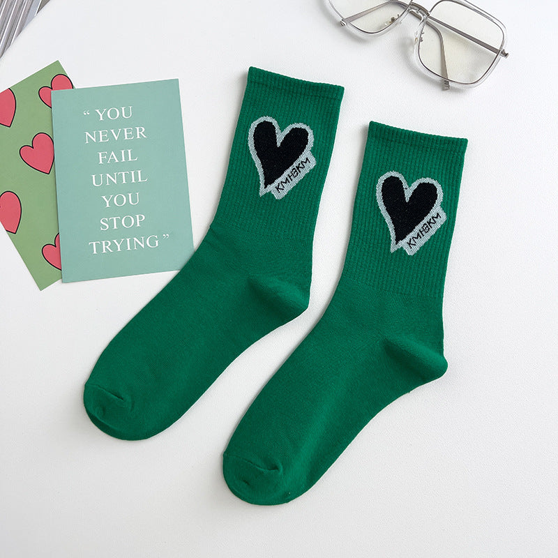 Vivid green Socks in darkgreen front picture