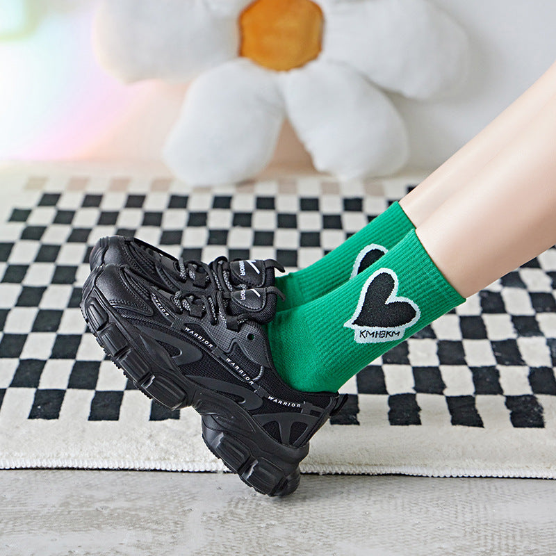 Vivid green Socks in green on runners